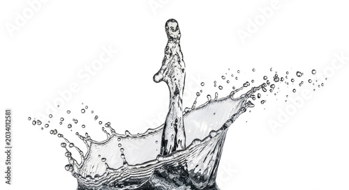Clear water splash with a central vertical column and crown-shaped ripples isolated on a solid black background