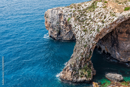 Photos Landscape shot of side of the blue grotto malta natural cave archway with deep b
