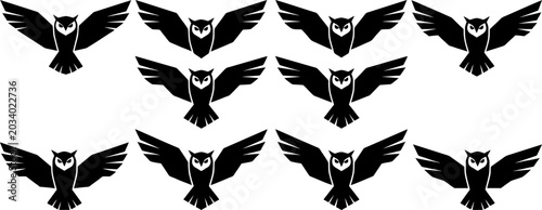 Foto Set of black owl silhouettes in flight with wide wingspans for nocturnal and maj