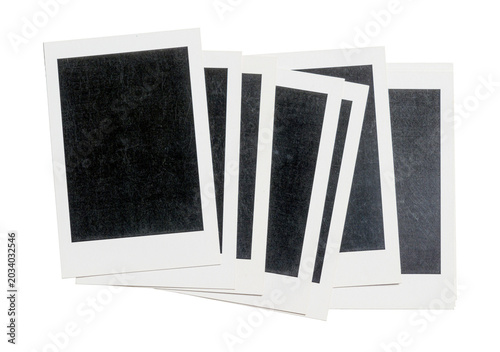 A collection of blank instant film frames arranged in a fan shape against a black background, perfect for photo mockups, memories, and nostalgic designs
