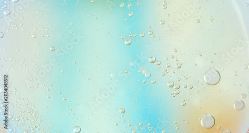 Foto Soft macro image of tiny air bubbles suspended in liquid with pastel blue, mint, cream, and beige tones