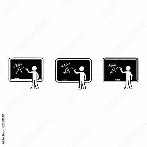 Teacher pointing at blackboard in classroom setting