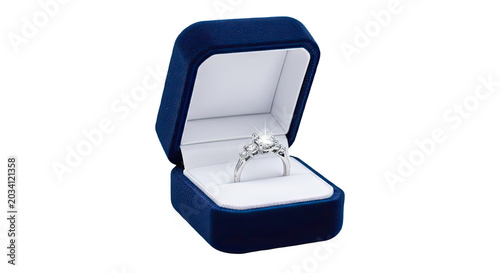 Elegant diamond engagement ring displayed in open luxury velvet jewelry box isolated on transparent background