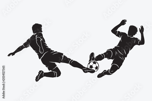 Vászonkép Two soccer players in action silhouette battling for ball possession sliding tac