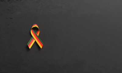 Ribbon bow red yellow orange green color black dark color concrete texture color ribbon bow juneteenth 19 nineteen day date june month america africa history racism peace justic copy space human right