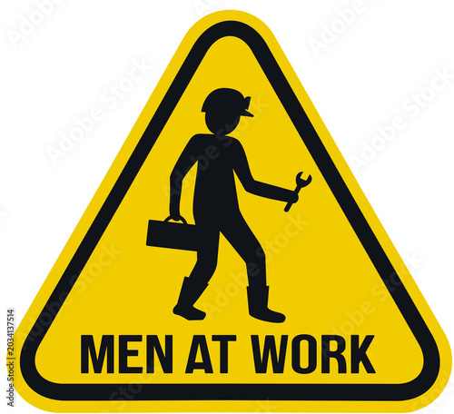 Yellow triangular sign warning that there are men working.
