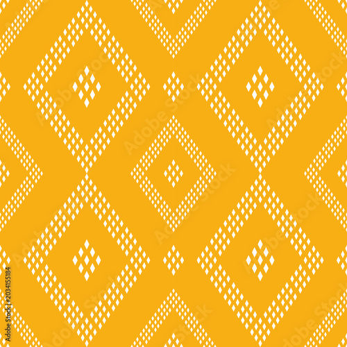 Foto geometric pattern with white dotted diamonds on a yellow background