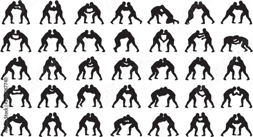 Obraz na plátně Silhouettes of wrestlers in various grappling positions.