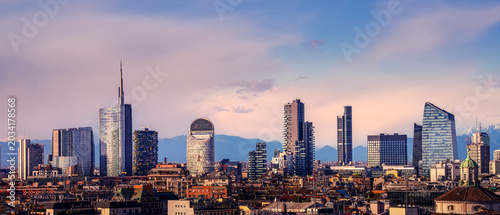 Milan skyline and CityLife area with the three tower skyscrapers at nice sunset