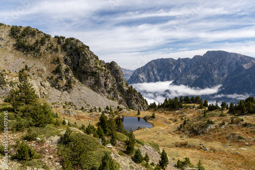 Mountain landscape with an alpine lake in the Belledonne Massif, French Alps, Isère