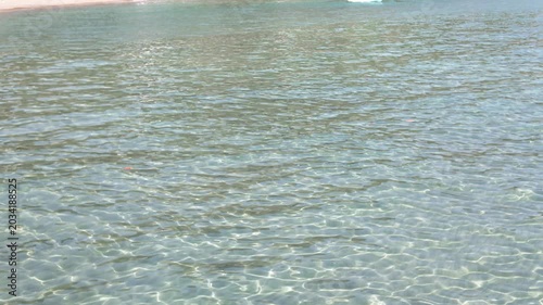 Close Up of Clear Turquoise Sea Water with Gentle Ripples