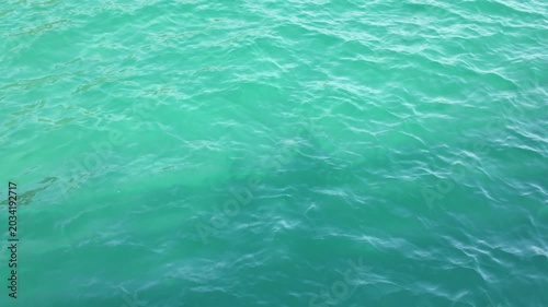 Top Down View of Vibrant Turquoise Ocean Water Surface