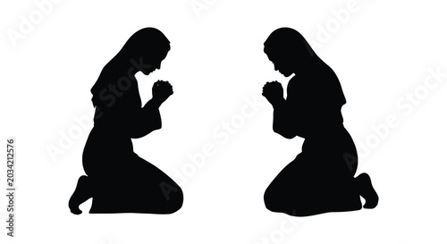 Fotografie Two women kneeling in prayer black silhouette against a white background silhoue