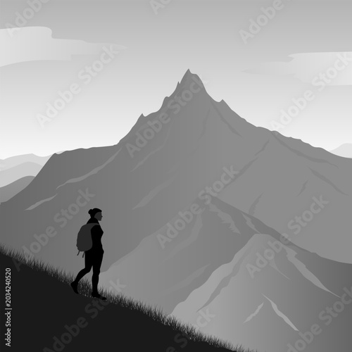 Grayscale illustration of a lone hiker standing on a grassy mountain slope while overlooking towering mountain peaks in the distance.