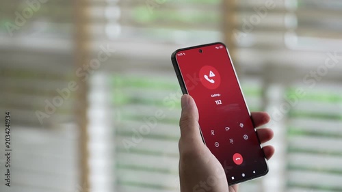 Man calling emergency number 112 for crisis situation