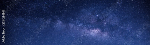 blue night sky milky way and star on dark background.with noise and grain.Photo by long exposure and select white balance.