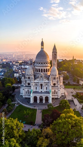Grand basilica at sunrise, city panorama