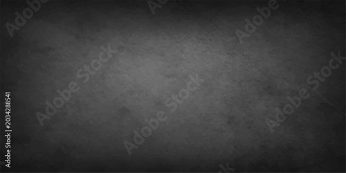 Fotografie A rough dark grunge concrete wall texture with a dirty grey stone surface and vi