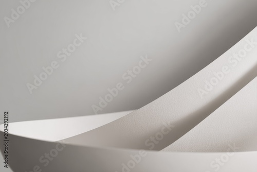Abstract minimalist design with white curved shapes and soft shadows