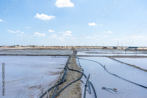 Obraz na plátně Salt evaporation ponds in arid industrial landscape