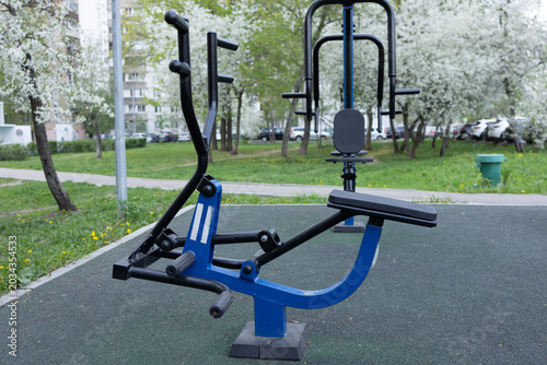 Obraz na płótnie Ryder outdoor simulator for strength training in a public park.