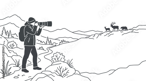 Foto A male wildlife photographer standing on a mountain trail capturing nature