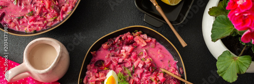 Vászonkép A vibrant bowl of cold beetroot soup features hard-boiled eggs and fresh herbs
