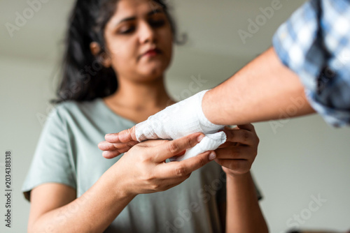 Photography Careful bandaging injured hand photo