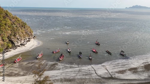 Aerial Drone View Of Sam Phraya Beach Thailand
Aerial drone footage of fishing boats near Sam Phraya Beach coastline in Thailand on 19 May 2026.
