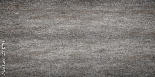 A textured, weathered grey wood grain surface with a subtle grain pattern, offering a rustic and natural background element.