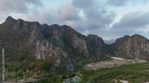 Aerial Drone View Of Khao Daeng Mountains Thailand
Aerial drone footage of dramatic limestone mountains at Khao Daeng View Point in Thailand on 19 May 2026.
