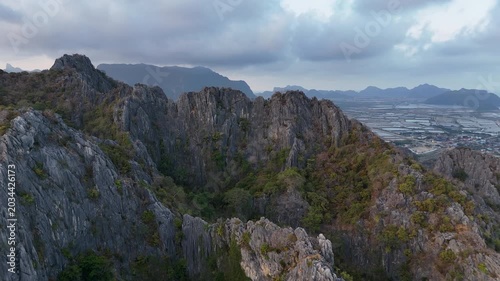 Aerial Drone View Of Khao Daeng Mountains Thailand
Aerial drone footage of dramatic limestone mountains at Khao Daeng View Point in Thailand on 19 May 2026.

