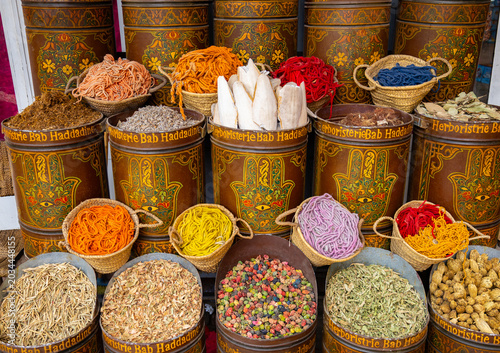 Colorful traditional spice and herb stall in a Moroccan souk