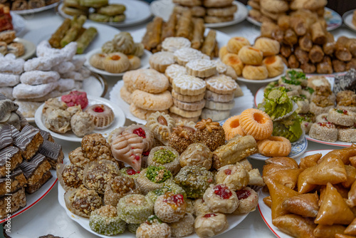 Selection of traditional Moroccan pastries and sweet cookies served on plates
