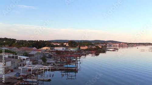 Aerial view of Bouzigues on the Thau Lagoon, in the Hérault department, Occitanie region, France