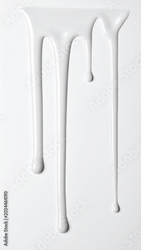 White Liquid Dripping On White Background With Smooth Texture