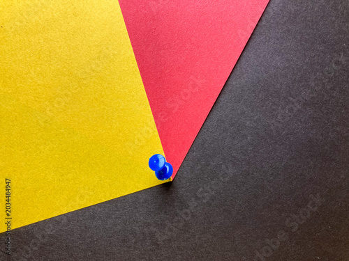 Colorful paper with pin, abstract background with pin