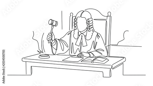Judge sitting at a desk holding a gavel.