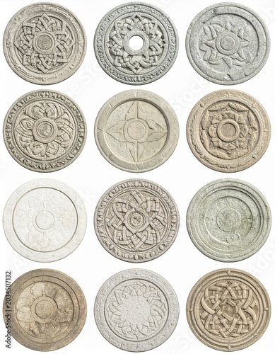 Collection of Stone Carved Circular Motifs on White Background