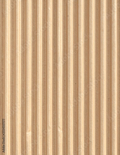 Brown Corrugated Cardboard Surface Texture with Vertical Lines Pattern Background