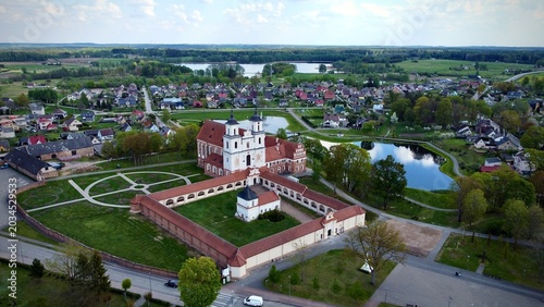 Tytuvenai Holy Virgin Mary Queen of Angels Church and Bernardine Monastery Ensemble is located in northern Lithuania. The aerial view shows the historic baroque-style church with twin towers