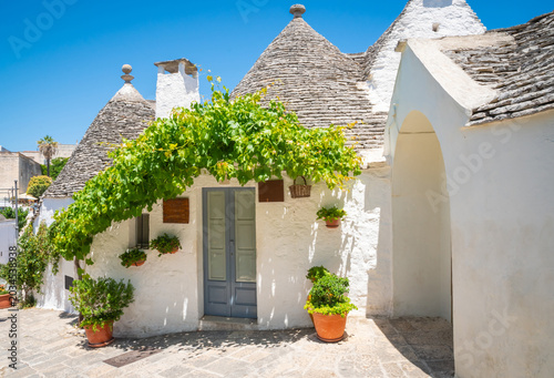 Beautiful old stone trulli houses with conical roofs in Alberobello, Puglia, Italy.