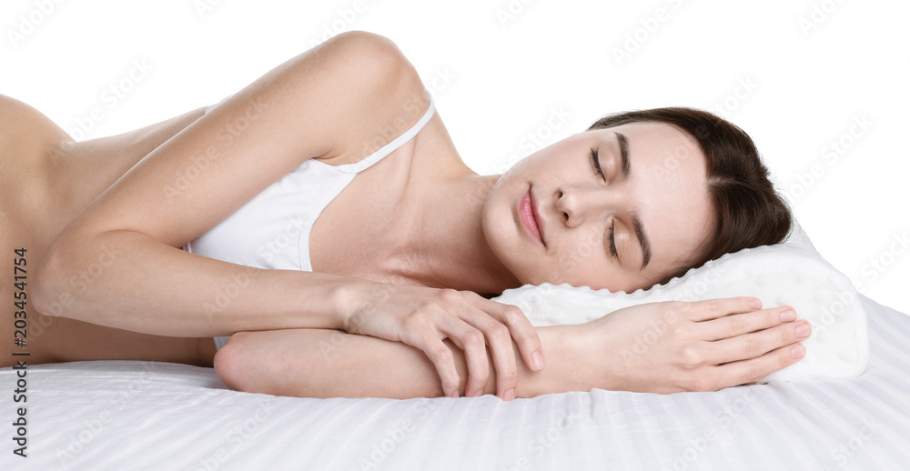 Obraz premium Woman sleeping on bed with orthopedic pillow against white background