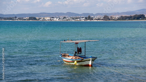 Fishing boat moored in the bay in Hammamet, Tunisia