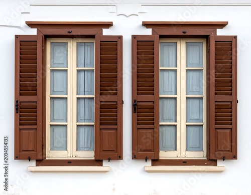 Symmetrical Brown Wooden Windows with Open Shutters on White Building Facade