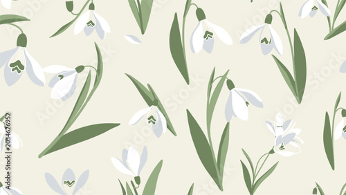 Seamless pattern featuring delicate white snowdrop flowers with green leaves on a light cream-colored background for spring.
