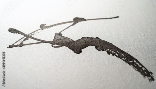 Abstract Ink Splatter on Textured White Paper