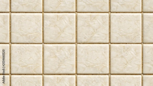 Close-up of a beige tiled wall with textured surface and grout lines