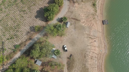 Drone footage Drive a pickup truck on deserted roads through rural tropical forests