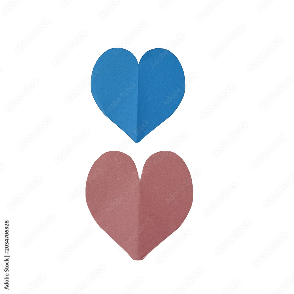 Obraz premium Two paper hearts in blue and pink colors